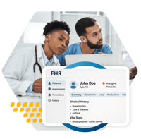 Two healthcare providers reviewing medical history of a patient